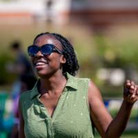 Two women dancing to music